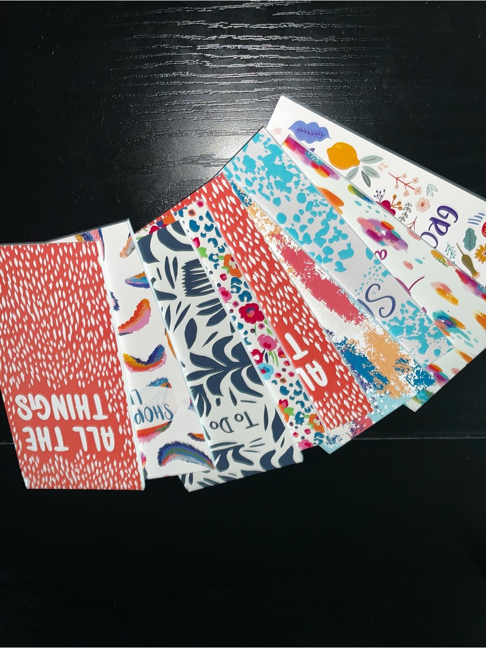 3 multicolored note books 📕